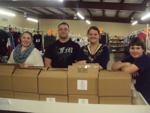 Enjoying a moment after a day of service at the Storehouse for Jesus. My niece and nephew are on the right.