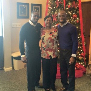 Dewayne, Patricia, and Tremayne sharing a moment at Christmas.